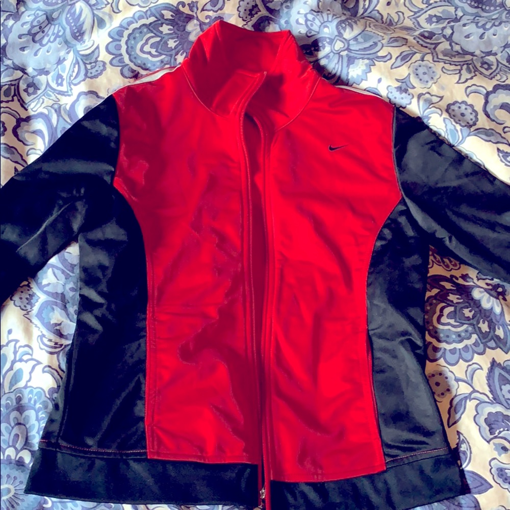 Nike zip-up athletic jacket. Excellent condition.